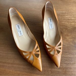 Kitten heel by Jimmy Choo .